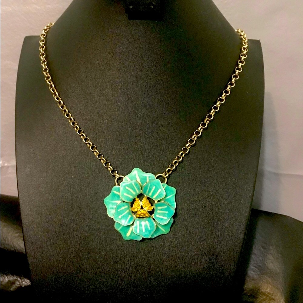 Coldwater creek necklace featuring aqua enameled flower with amber rhinestones